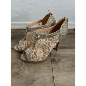 Women’s lace and rhinestone peep toe heels